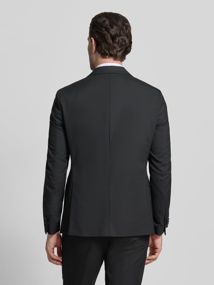 Männermodel trägt 2-Knopf-Smoking mit Reverskragen von MCNEAL in Schwarz, Material-Mix, Regular Fit, Ganzkörperansicht Rückansicht.