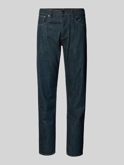 Produktfoto, Slim Tapered Fit Jeans Modell 'Streem' von G-Star Raw aus dunkelblauer Baumwolle mit Eingrifftaschen vor grauem Hintergrund