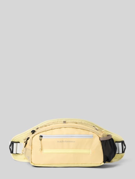Produktfoto, Trail Hip Bag mit Logo-Print und Ritsvak van Peak Performance in zachtgeel, verstelbare kliksluiting, 32x17x9 cm, schouderbandlengte 67 cm