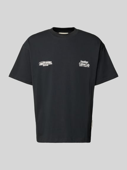 Produktfoto, T-Shirt mit Label-Print von ANOTHER COTTON LAB in Schwarz, Reine Baumwolle, Lockerer-Schnitt, gerippter Rundhalsausschnitt, Rückenlänge 71 cm bei Größe M