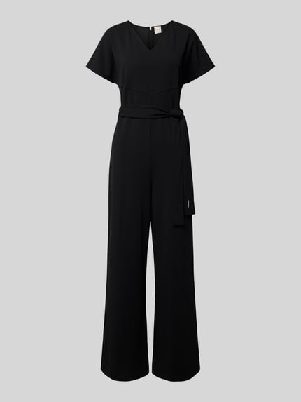 Produktfoto, Jumpsuit mit V-Ausschnitt von Calvin Klein Womenswear im schwarzen Material-Mix mit Stretch-Anteil, lockerer Schnitt, Taillengürtel, Nahtreißverschluss, Gesamtlänge 108 cm bei Größe S, glatte Textur