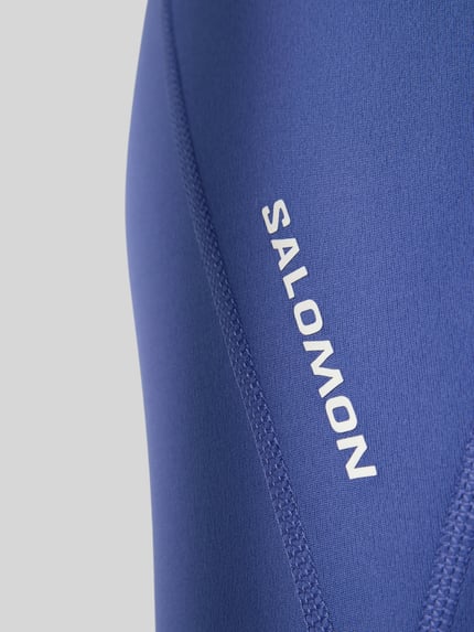 Produktfoto, elastyczna mieszanka materiałów w kolorze niebieskim, nadruk z logo, Slim Fit, Slim Fit Leggins mit Logo-Print Modell 'Bliss' od Salomon