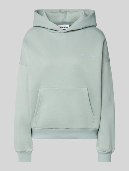 Productfoto, Hoodie met logo en kangoeroezak van Review, katoenmix, relaxed fit, dames hoodie met logoprint, kleur lichtgroen.