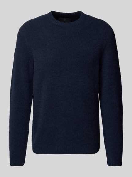Produktfoto, granatowy Strickpullover mit gerippten Abschlüssen Modell 'BLASIMON' von Jack & Jones Premium, luźny krój, okrągły dekolt, dzianina z dodatkiem wełny, gładka tekstura.