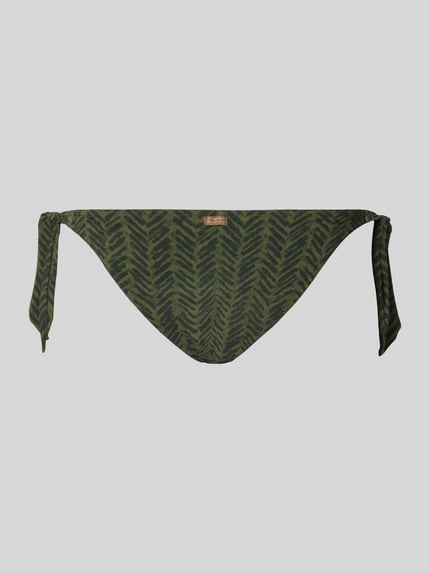 Produktfoto, Bikini-Slip mit Label-Detail Modell 'DASIA' von Banana Moon in grünem Zickzackmuster, Schnürverschluss, elastischer Material-Mix