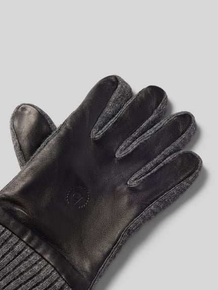 Productfoto, Handschuhe aus echtem Leder van bugatti, zwart leer, grijze gebreide textuur, labeldetail, elastische boorden