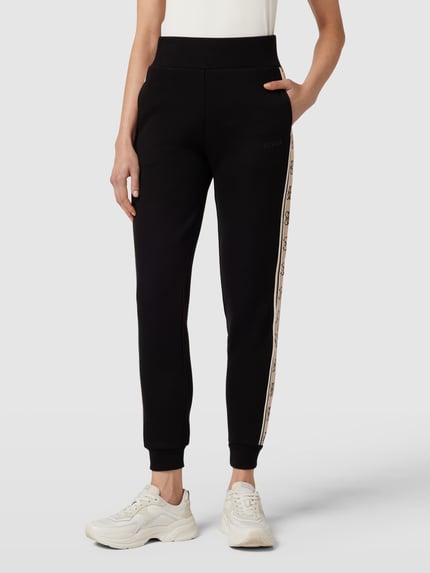 GUESS Activewear spodnie dresowe o kroju regular fit z lampasami model 'BRITNEY' Czarny 4
