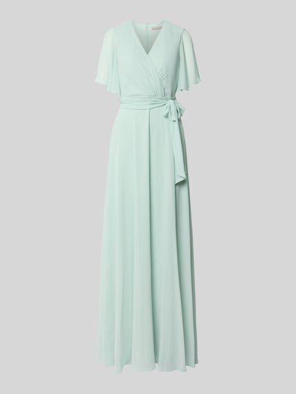 Produktfoto, Regular Fit Abendkleid mit V-Ausschnitt von Christian Berg Cocktail in Mint, Wickel-Optik, Taillierte Passform, Kurzärmeliges Design, abnehmbares Stoffband, blickdichter Unterrock, Rückenlänge 150 cm, Brustweite 32 cm, Ärmellänge 23 cm, fließende Textur, sanfte Farbgebung
