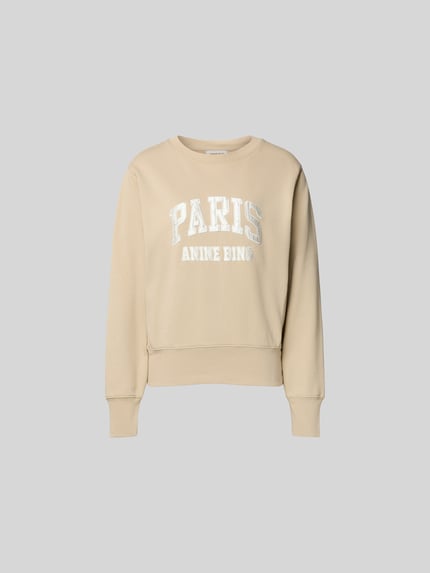 Produktfoto, Sweatshirt aus reiner Baumwolle von Anine Bing, beige Farbe, lockere Passform, Rundhalsausschnitt, Label-Detail, elastische Abschlüsse