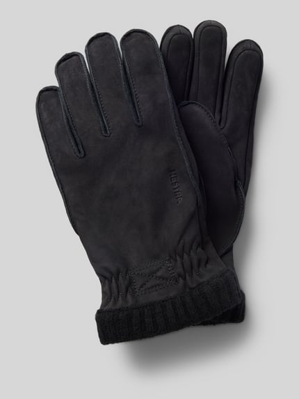 Productfoto, zwarte handschoenen uit echt leder met labeldetail, elastische boorden, Joar Nubuck van Hestra, herenmode.