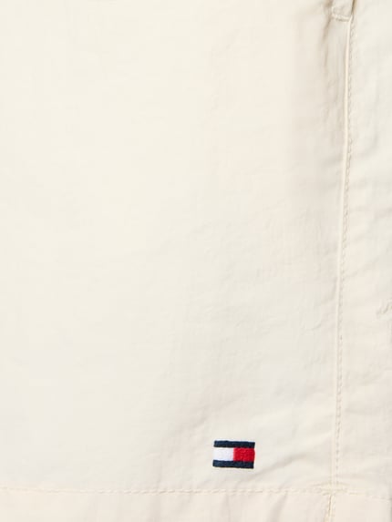 Produktfoto, Regular Fit Badehose mit Logo Stitching von Tommy Hilfiger in Optik: Unifarben mit Stitching-Applikation, glatte Textur.