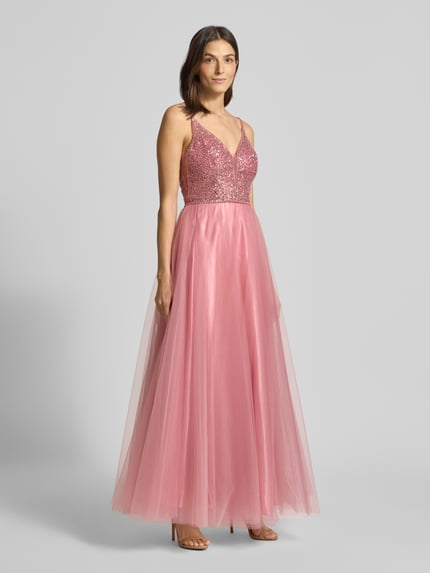 Vrouwenmodel draagt Abendkleid mit Pailettenbesatz van Hey Kyla in roze met glinsterende pailletten, tule, uitlopend model, vooraanzicht.