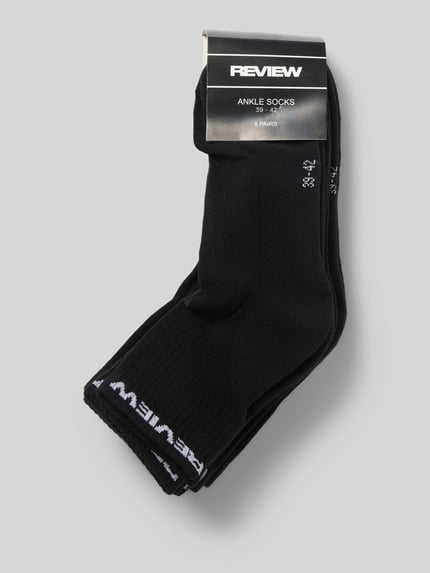 Produktfoto, zwarte sokken uit katoenmix met labelstitching van REVIEW, elastische boordjes, set van 5, labeldetail