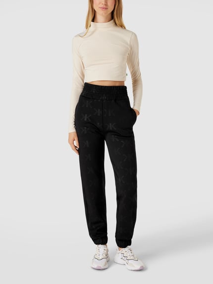 Kendall & Kylie Sweatpants mit Allover-Logo Modell 'EMBOSSED' Black 1