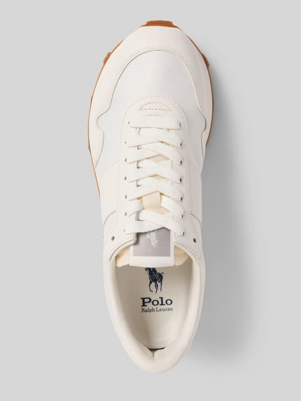 Produktfoto, Sneaker met geprofileerde zool van Polo Ralph Lauren, mix van leer en textiel, afgeronde punt, vetersluiting, labeldetail, zoolhoogte maat 40: 4 cm, schachthoogte: 8 cm, schachtbreedte: 6 cm.