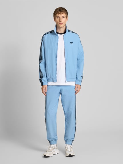 adidas Originals Spodnie dresowe o kroju regular fit z wyhaftowanym logo model ‘FIREBIRD’ Szaroniebieski 1