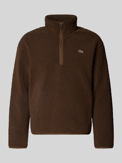 Produktfoto, braunes Regular Fit Sweatshirt mit Troyer-Kragen von Lacoste, weiche Struktur, Vorderansicht, Herren Sweatshirt von Lacoste