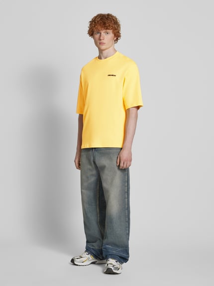REVIEW T-shirt o kroju oversized z nadrukiem z logo Pastelowy żółty 1