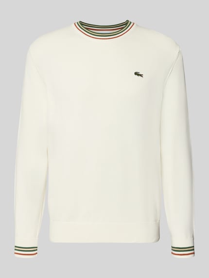 Produktfoto, Regular Fit Pullover aus reiner Wolle von Lacoste Heren, gebroken wit, fijne structuur, groene en rode accenten op boord en manchetten