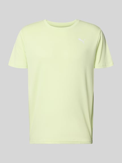 Productfoto, TRAINING T-Shirt mit Label-Detail Modell van PUMA PERFORMANCE in lichtgeel, rechte fit, ronde hals, korte mouwen, labeldetail, ruglengte maat M 73 cm