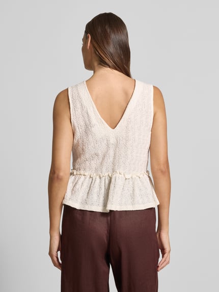Vrouwenmodel draagt Blusentop mit Schnürung und Schößchen van JAKE*S STUDIO WOMAN in beige met structuur, regular fit, schootje, rugpand, katoenmix met stretch, ruglengte 33 cm bij maat 36, volledige rugaanzicht.