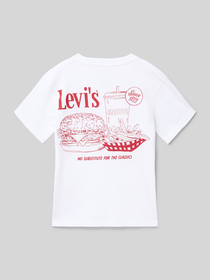 Junge trägt Regular Fit T-Shirt aus Baumwoll-Mix Modell 'LVB BURGER MEAL TEE' von Levi’s® Kids, Optik: Unifarben, Motiv-Print, Ganzkörperansicht Rückansicht.