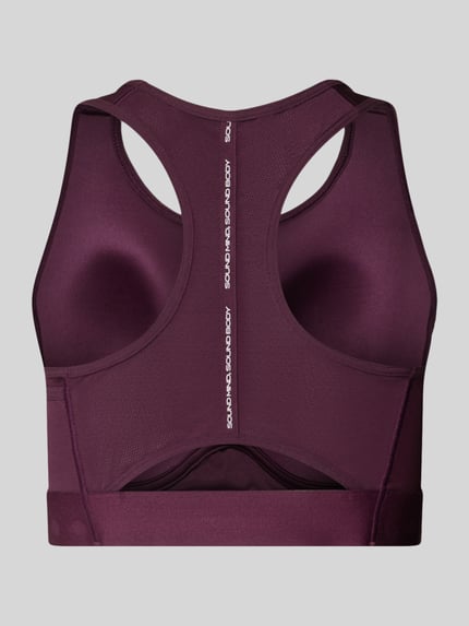 Produktfoto, Sport-BH mit Racerback Modell 'ROAD COMPRESSION' von ASICS in dunklem Lila, Elastikband mit Logo, glatte Textur, Material-Mix mit Stretch-Anteil, Rückansicht
