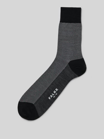Produktfoto, Socken mit Label-Print von Falke für Herren im Schurwoll-Mix mit körpernahem Schnitt, geripptem Abschluss und Label-Print.