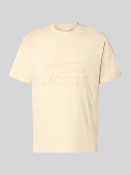 Produktfoto, Regular Fit T-Shirt aus reiner Baumwolle von Lacoste in Optik: Unifarben mit Logo-Print, Kurzarm, Rundhals, glatte Textur.