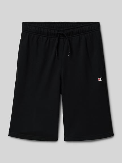Produktfoto, Sweatshorts mit Logo und elastischem Bund von CHAMPION aus Baumwoll-Mix, relaxed Fit, schwarz, glatte Textur, Kindergröße 140