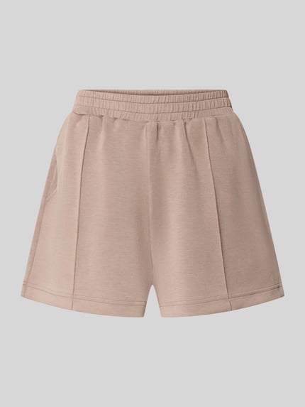Produktfoto, Relaxed Fit Shorts mit Modal-Anteil von Marc O'Polo in Unifarbe, Sweat-Materialmix, elastischer Bund, fixierte Bügelfalten, Gesäß- und seitliche Eingrifftaschen, Label Stitching.
