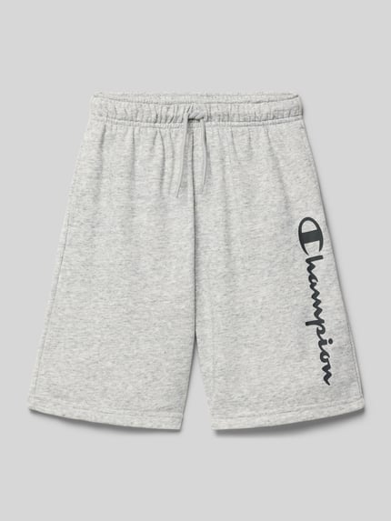 Produktfoto, Shorts mit Logo und elastischem Bund von CHAMPION, Kinder Shorts, grau, Baumwoll-Mix, Relaxed Fit, sichtbares Logo, elastischer Bund mit Tunnelzug, glatte Textur, Produkt auf neutralem Hintergrund.