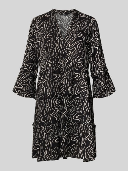 Produktfoto, Ausgestelltes Blusenkleid aus reiner Viskose Modell 'EASY JOY' von Vero Moda, schwarz mit cremefarbenem Allover-Muster, Trompetenärmel, Mini-Länge, Henley-Ausschnitt, leichte Raffung, glatte Textur
