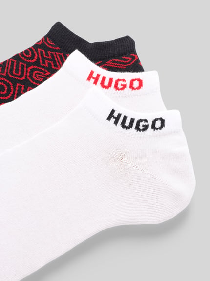 Produktfoto, trzy pary skarpet z mieszanki bawełny od HUGO, biel, czerń, czerwień, gładka struktura, Herren Socken von HUGO