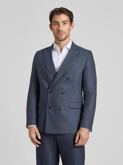 Männermodel trägt Sakko mit Reverskragen Modell 'Gringo' von CG - Club of Gents im Material-Mix mit Viskose-Anteil, Regular-Fit, Ganzkörperansicht von vorne.