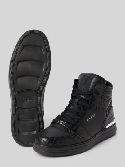 Produktfoto, Sneaker aus Leder-Mix Modell 'WYSTOR' von GUESS in Schwarz mit abgerundeter Passform, strukturierter Sohle und Schnürverschluss, Herren Sneaker, Absatzhöhe 3 cm, Schafthöhe 11 cm, Schaftweite 10 cm