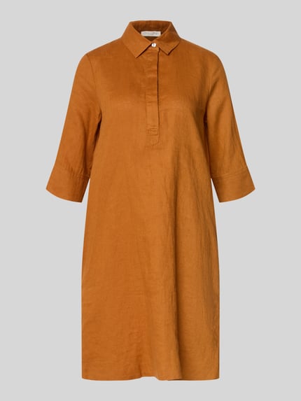 Produktfoto, Knielanges Hemdblusenkleid aus Leinen mit 3/4-Arm von Christian Berg Woman in warmem Braunton mit Hemdblusenkragen, verdeckter Knopfleiste und A-Linie, leicht strukturierte Oberfläche, Hintergrund neutral, reines Leinen, für Damen, Knielänge, Rückenlänge 96 cm, Brustweite 54 cm, Ärmellänge 41 cm, Größe 36.