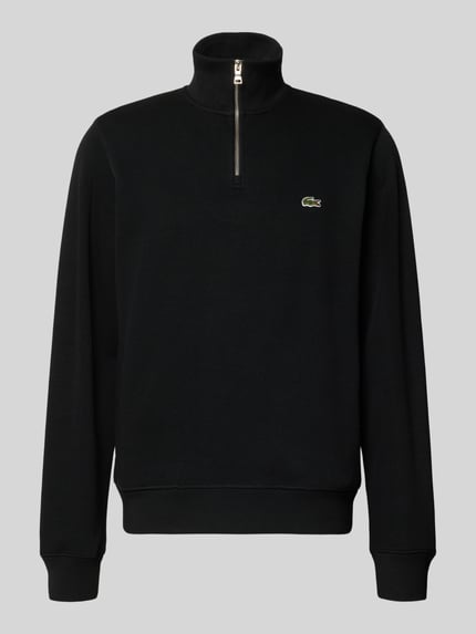 Produktfoto, Regular Fit Troyer aus reiner Baumwolle von Lacoste in Schwarz, grobe Textur, silberner Zipper, dezentes Logo auf Brust
