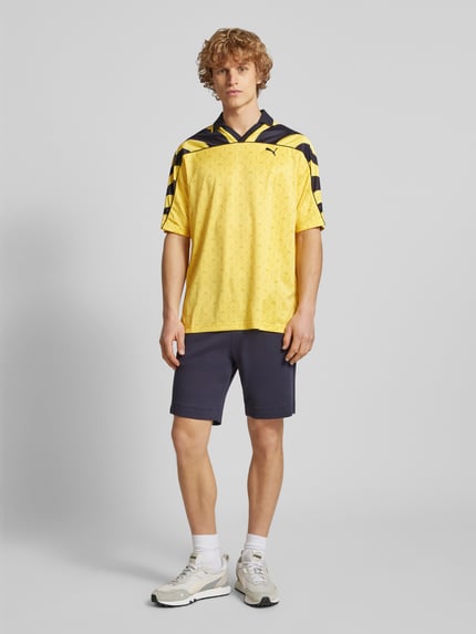 PUMA Performance Relaxed Fit Trikot mit Logo-Print Modell 'ROAD TO UNITY' GELB 1