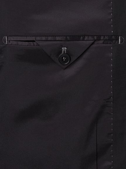 Produktfoto, detail van de binnenzijde van het Regular Fit Sakko met woll-anteil Model 'Irving' van Drykorn, gladde zwarte materiaalmix met paspelzak en knoop. Context: Heren colbert met elastische materiaalmix met wol, regular fit, reverskraag, dubbele knoopsluiting, paspelzakken, borstzak, ruglengte maat 50: 72 cm, schouderbreedte: 44 cm, mouwlengte: 63 cm.