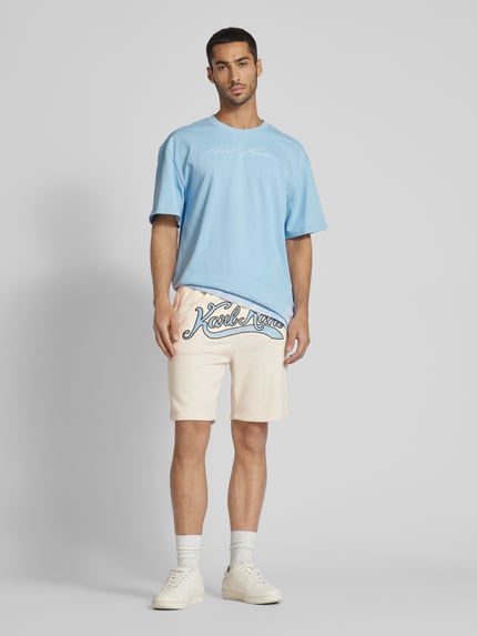 Karl Kani Regular fit sweatshorts met labelstitching Offwhite - 1