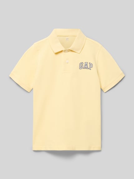 Produktfoto, Poloshirt mit Logo und Knopfleiste von GAP, reine Baumwolle, regular Fit, gelb, kurze Ärmel, glatte Textur, Kindergröße 116