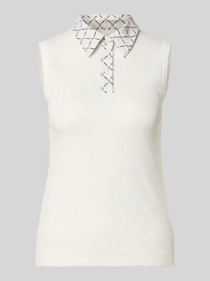 Top mit Polokragen und Logo-Muster Shop The Look MANNEQUINE