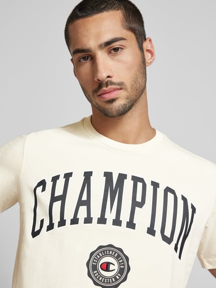 Champion T-shirt z nadrukiem z logo model 'Bookstore' Złamany biały 3