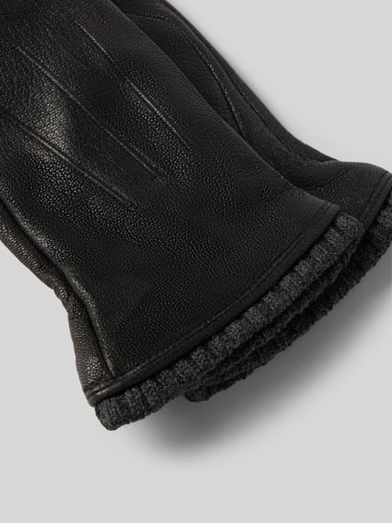 Produktfoto, Handschuhe aus echtem Leder von EEM in Schwarz mit Ziernähten, eingefassten Abschlüssen, unifarbenes Design, strukturierte Oberfläche