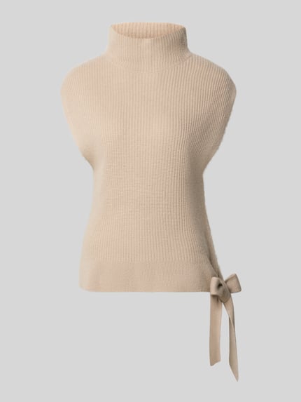 Produktfoto, Relaxed Fit Pullunder aus reinem Kaschmir mit Stehkragen von Christian Berg Woman in Beige, Zierschleife am Saum, ärmellos, weiche Stricktextur