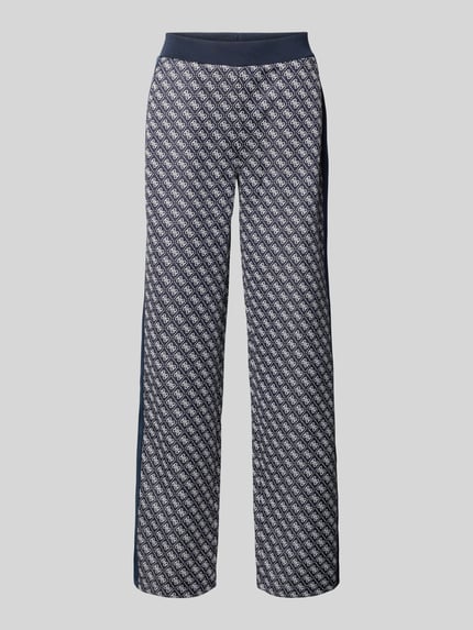 Produktfoto, Wide Leg Sweatpants im Allover-Look Modell 'MAYA' von Guess Activewear, dunkelblau mit Muster, elastischer Bund, Damenmode.
