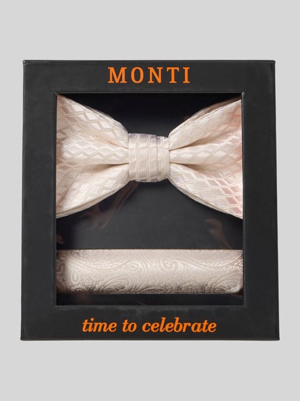 Produktfoto, Fliege aus Seide im Set mit Einstecktuch von Monti, cremefarben mit klassischer Form und Paisley-Muster in Geschenkbox.