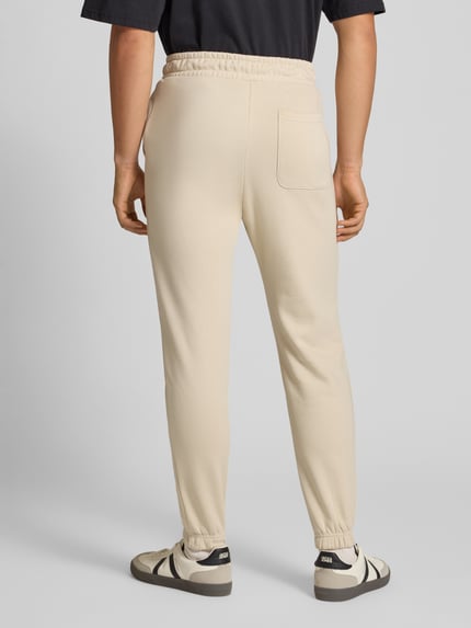 JACK & JONES Spodnie dresowe w kroju regular fit z elastycznym pasem model 'KANE' Beżowy 5