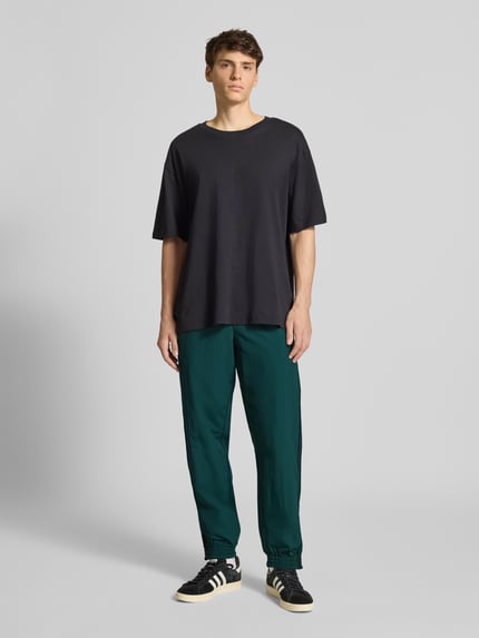 adidas Originals Sweatpants mit elastischem Bund Dunkelgruen 1